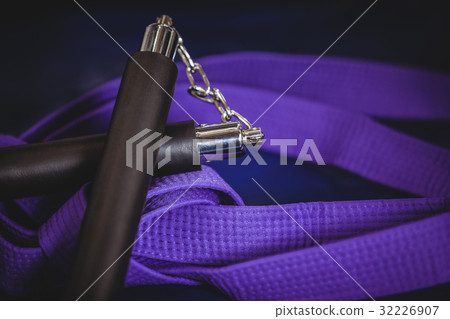 Nunchaku and purple belt 32226907