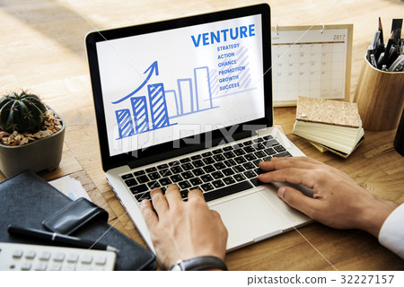 Hands working on laptop network graphic overlay 32227157