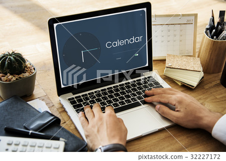 People using laptop with clock and time icon People using laptop with clock and time icon 32227172
