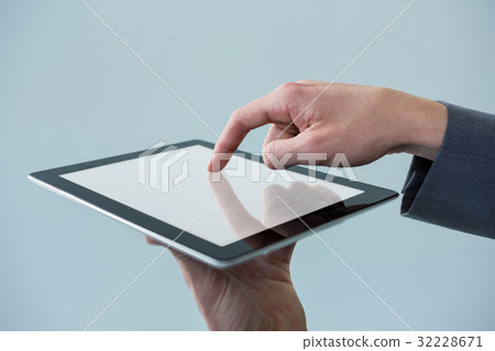 Businessman using digital tablet 32228671