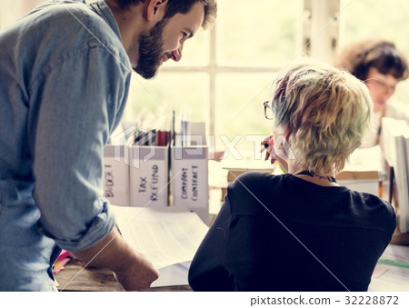 Colleagues Exchanging Opinion Ideas Working Colleagues Exchanging Opinion Ideas Working 32228872