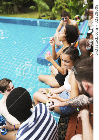 Group of diverse friends enjoying summer time by the pool 32229008