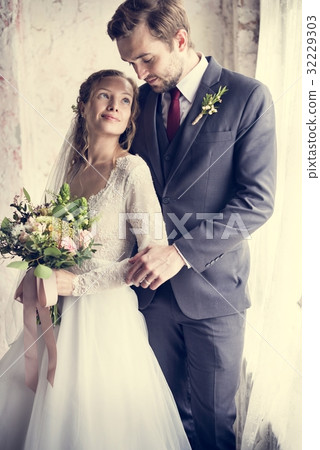 Bride and Groom Standing Holding Flowers Bouquet Together Love H 32229303