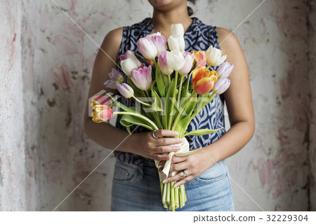Woman Hands Holding Beautiful Flowers Bouquet 32229304