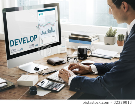 Man working on computer network graphic overlay 32229913