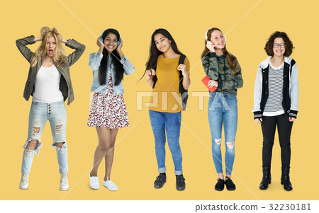 Diverse group of cheerful girls standing in a row Diverse group of cheerful girls standing in a row 32230181