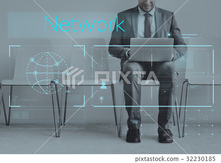 Businessman connected with global communications network Businessman connected with global communications network 32230185
