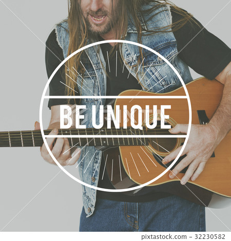 Man Playing Guitar with Be Unique Lifestyle Motivation Word Man Playing Guitar with Be Unique Lifestyle Motivation Word 32230582