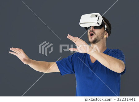 A man using a visualiaing reality gadget 32231441