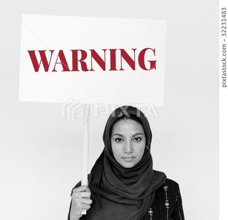 Woman hold caution alert sign 32231483