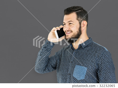 Man standing and using phone to pose for photoshoot Man standing and using phone to pose for photoshoot 32232065