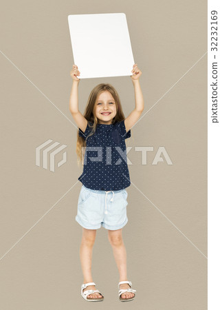 Little girl smiling and holding blank placard 32232169