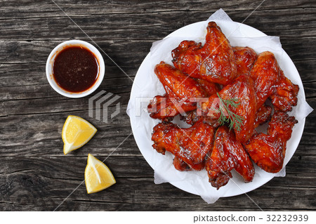 crispy roasted chicken wings on plate crispy roasted chicken wings on plate 32232939