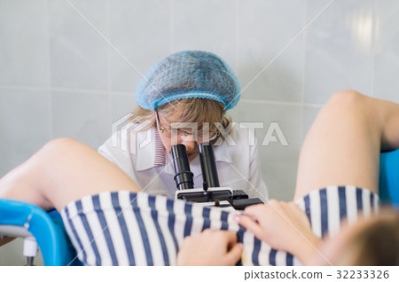 Young Female Gynecologist During Examination In 32233326