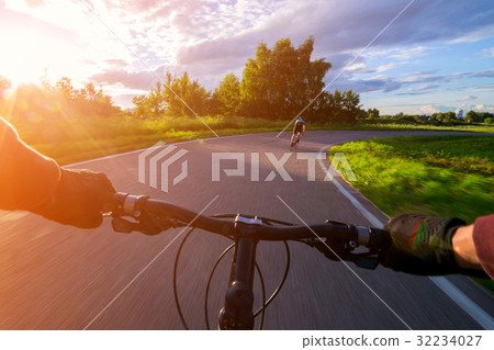 Riding a bike first person perspective. 32234027
