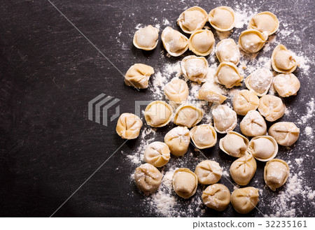 fresh russian pelmeni, ravioli or dumplings 32235161