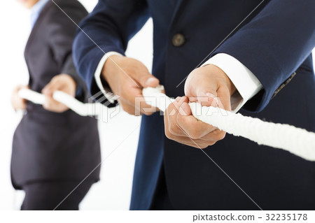 businessman work together and playing tug of war businessman work together and playing tug of war 32235178