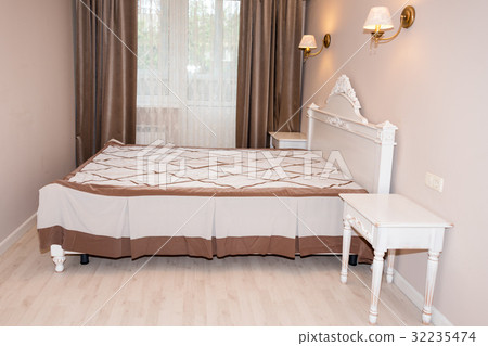 Small modern bedroom interior. Pastel colors Small modern bedroom interior. Pastel colors 32235474