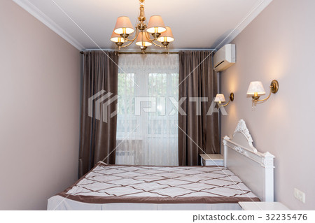 Small modern bedroom interior. Pastel colors Small modern bedroom interior. Pastel colors 32235476
