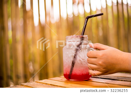 Strawberry Soda holding in the hand Strawberry Soda holding in the hand 32236255