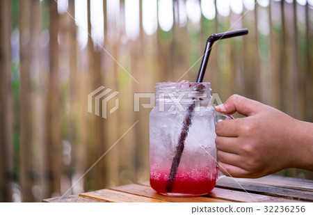 Strawberry Soda holding in the hand Strawberry Soda holding in the hand 32236256