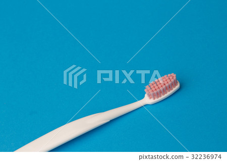 Photo of one pink toothbrush Photo of one pink toothbrush 32236974