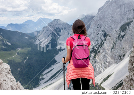 female hiker admiring beautiful view 32242363