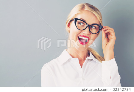 Young businesswoman in a thoughtful pose 32242784