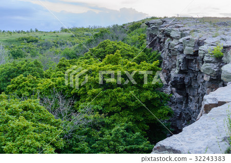 Summer Landscape with Rocky ledge cliff 32243383