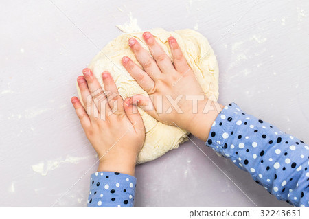 Children hands make a dough Children hands make a dough 32243651