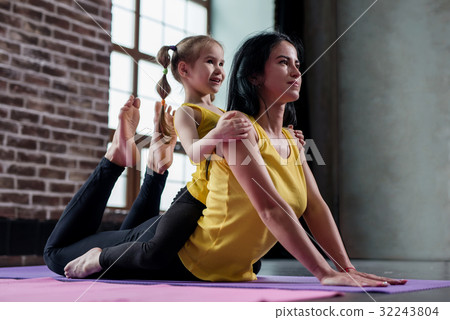 Young Caucasian woman doing stretching exercise 32243804