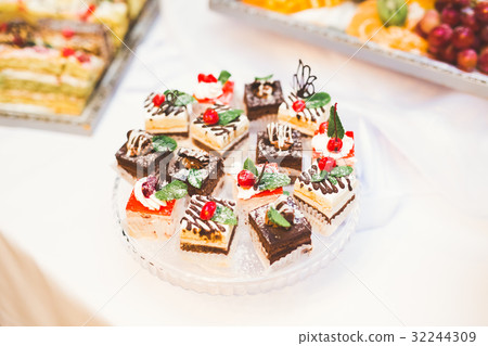 Different kinds of baked sweets on a buffet 32244309