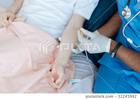 Sick teenager lying in his bed at home 32245992