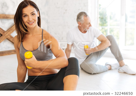Confident woman showing her strength of hands 32246650