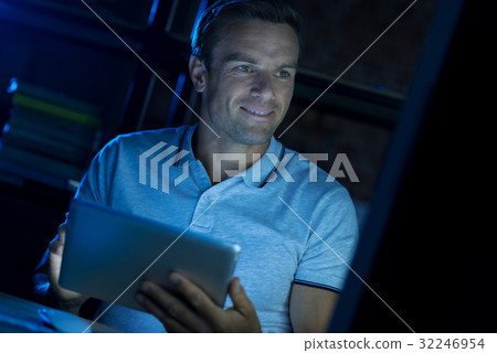 Enthusiastic intelligent man dedicated to his work 32246954