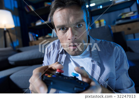 Determined ambitious guy trying completing a level 32247013
