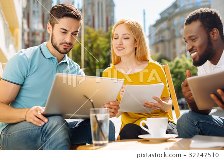 Lively talented professional having a look at data 32247510