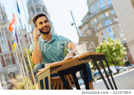 Persuasive energetic man discussing project with a 32247864