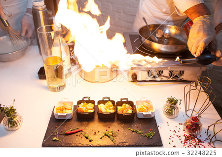 Chef with fire burner cooking stove 32248225