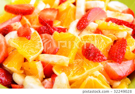 Fruit salad with strawberries, oranges and bananas Fruit salad with strawberries, oranges and bananas 32249028