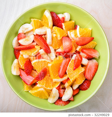 Fruit salad with strawberries, oranges and bananas Fruit salad with strawberries, oranges and bananas 32249029