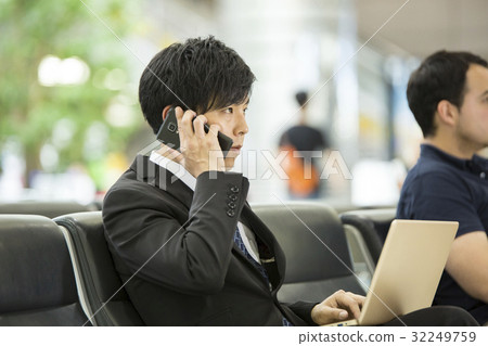 Foreigners waiting for flight and businessmen Foreigners waiting for flight and businessmen 32249759