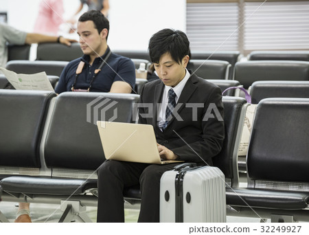 Foreigners waiting for flight and businessmen 32249927