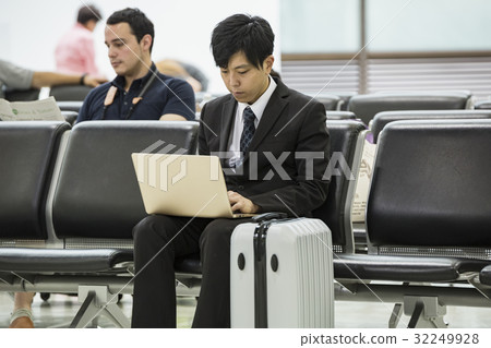 Foreigners waiting for flight and businessmen Foreigners waiting for flight and businessmen 32249928