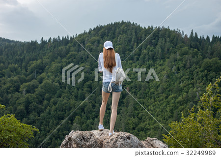 red hair girl on the top of mountain red hair girl on the top of mountain 32249989