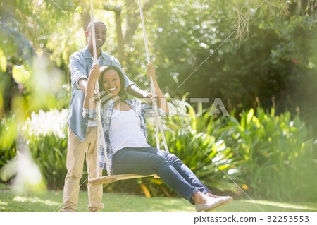 Happy family doing swing Happy family doing swing 32253553