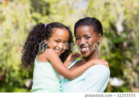 Happy family posing together Happy family posing together 32253555