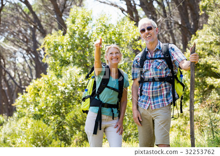 Senior couple standing with their stick 32253762