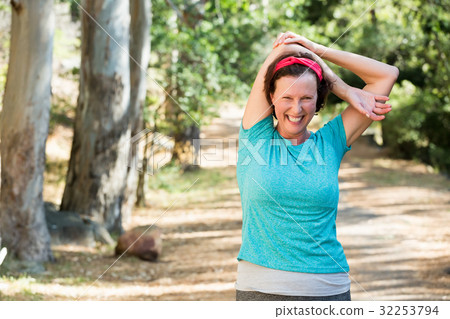 Woman stretching her arms 32253794