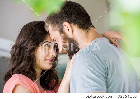 Beautiful young couple embracing each other Beautiful young couple embracing each other 32254116